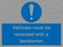 vehicles-must-be-reversed-with-a-banksman~